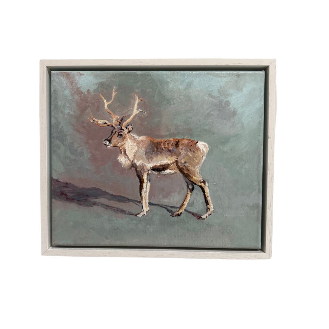 Hand-painted reindeer oil artwork in a sleek white wooden frame, ideal for winter decor and wildlife-inspired interiors.